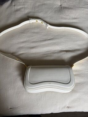 JW PEI White Saddle Crossbody Bag with Gold Accents